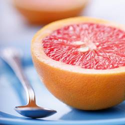halved pink grapefruit