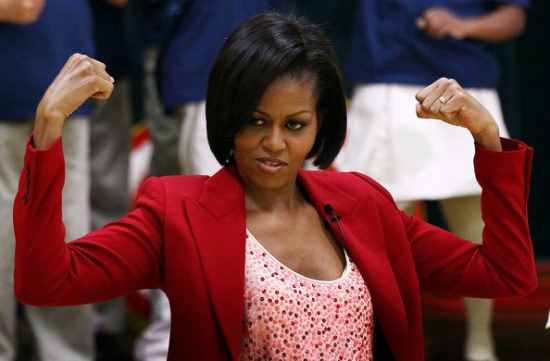 michelle_obama_u-s-_first_lady_michelle_obama_flexes_her_muscles_as_she_exercises_with_schoolchildren_at_the_river_terrace_school_april_21_2010_in_washington_dc-_mrs_0.jpg