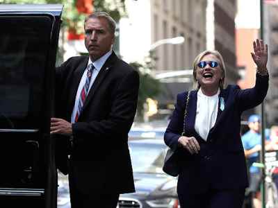 NEW YORK, NY - SEPTEMBER 11:  Democratic presidental nominee former Secretary of State Hillary Clinton waves as she leaves the home of her daughter Chelsea Clinton on September 11, 2016 in New York City. Hillary Clinton left a September 11 Commemoration Ceremony early after feeling overheated and went to her daughter's house to rest.  (Photo by Justin Sullivan/Getty Images)